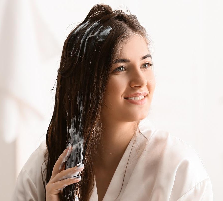 woman with product in hair