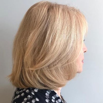 Woman with short blonde hair