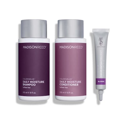 Bottles of Madison Reed ColorSolve™ Customizable Shampoo + Conditioner with purple labels on a white background